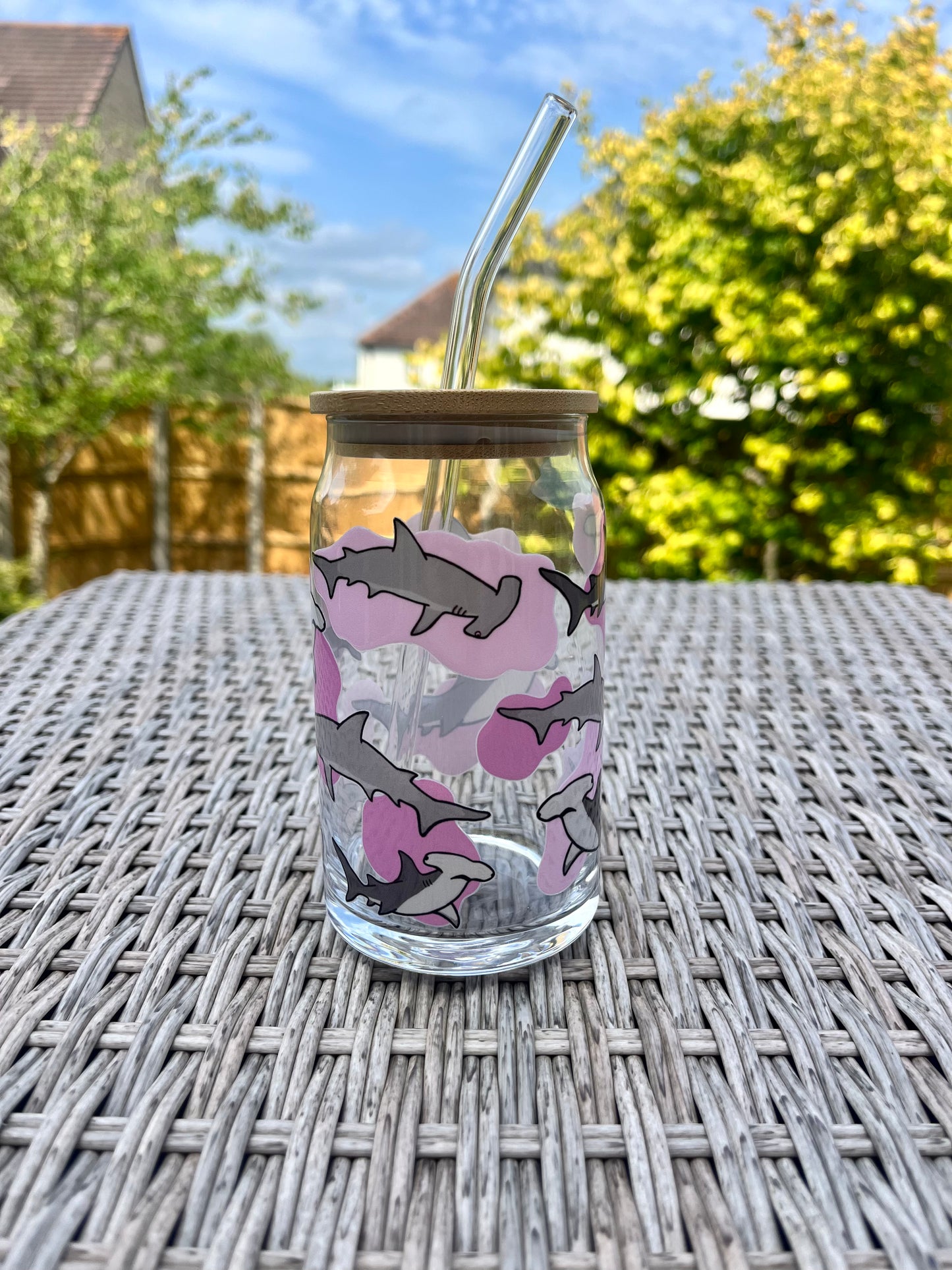 Hammerhead 16 oz glass cup with a bamboo lid and glass straw